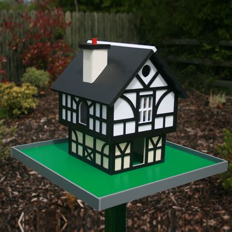 tudor bird|tudor birdhouse cuckoo garden.